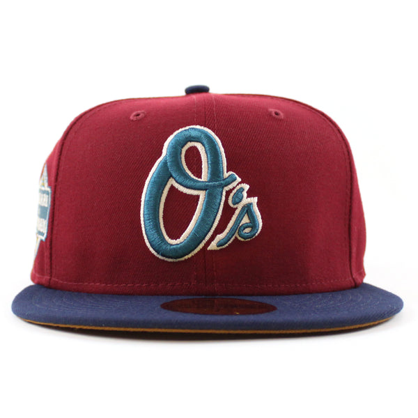 Baltimore-Orioles-20TH-ANNIVERSARY-Camden-Yards-59Fifty-New-Era-Fitted-Hat-_CARDINAL-OCEANSIDE-BLUE-TOASTED-PEANUT-Under-Brim_-3_600x600.jpg