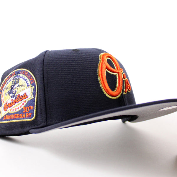 BaltimoreOriolesAtraditionOfExcellence30thAnniversary59FiftyNewEraFittedHat_NavyGrayUnderBrim_-1_600x600.jpg