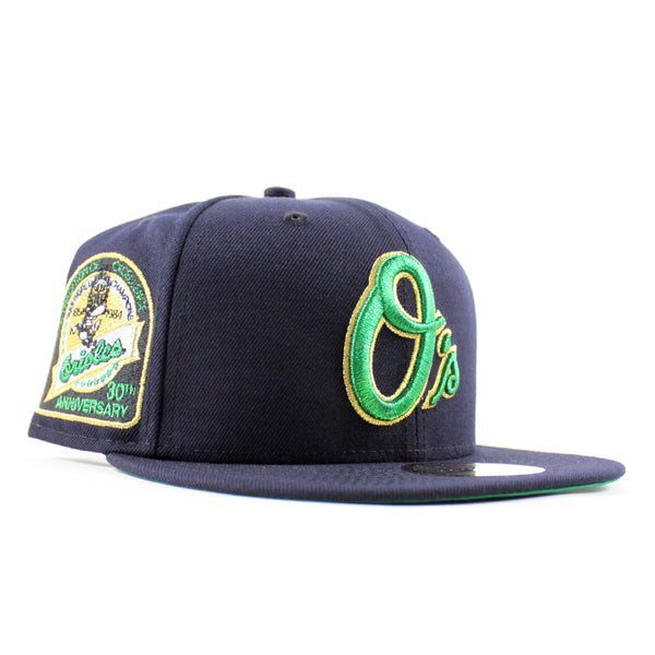 BaltimoreOriolesAtraditionOfExcellence30thAnniversary59FiftyNewEraFittedHat_NavyGreenUnderBrim_-4_600x600.jpg