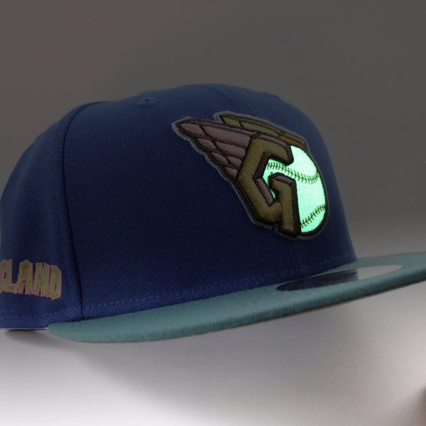 Cleveland-Guardians-CLEVELAND-New-Era-59Fifty-Fitted-Hat-_SONGBIRD-BLUE-PINE-NEEDLE-GREEN-NEW-OLIVE-Under-Brim_-0_600x600.jpg