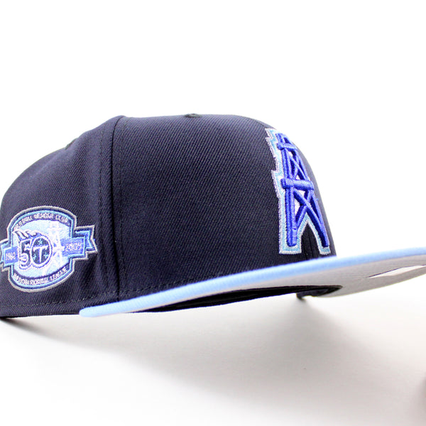 HOUSTON-OILERS-50th-Anniversary-New-Era-59Fifty-Fitted-Hat-_Navy-Sky-Blue-Gray-Under-Brim_-Air-Jordan-1-Retro-High-OG-_UNC-Toe_-1_600x600.jpg
