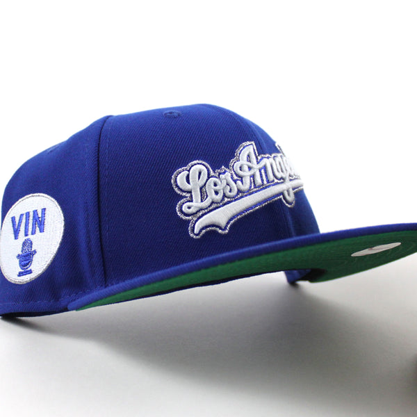 LosAngelesDodgersVinScullyMicrophonePatchNewEra59FiftyFittedHat_RoyalBlueGreenUnderBrim_-1_600x600.jpg