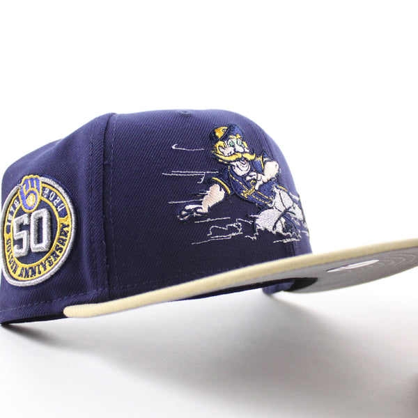 Milwaukee-Brewers-Bernie-Brewer-50th-Golden-Anniversary-New-Era-59Fifty-Fitted-Hat-_Light-Navy-Vegas-Gold-Gray-Under-Brim_-1_600x600.jpg
