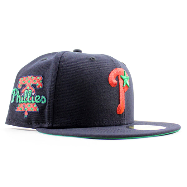 PhiladelphiaPhilliesLibertyBellPatch59FiftyNewEraFittedHat_NavyandGreenUnderBrim_-4_600x600.jpg