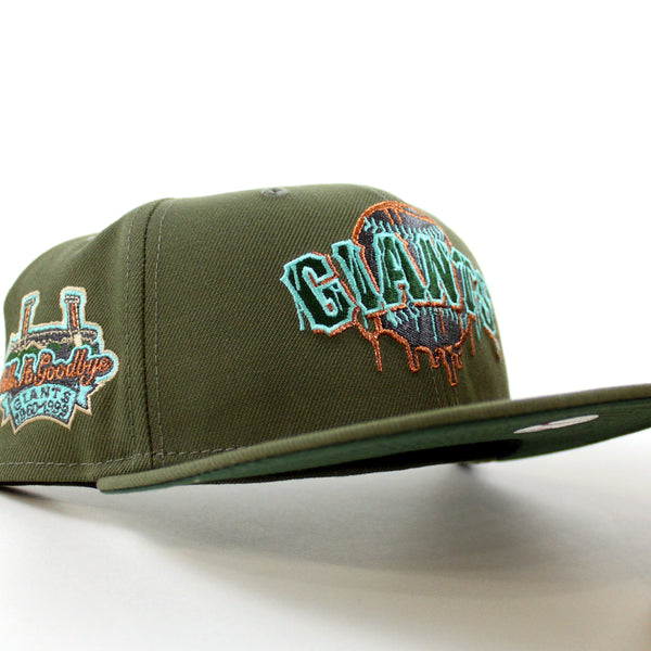 San-Francisco-Giants-1960-1999-TELL-IT-GOODBYE-New-Era-59Fifty-Fitted-Hat-_Zombie-Pack-Pack-Olive-Green-Green-Under-Brim_-1_600x600.jpg